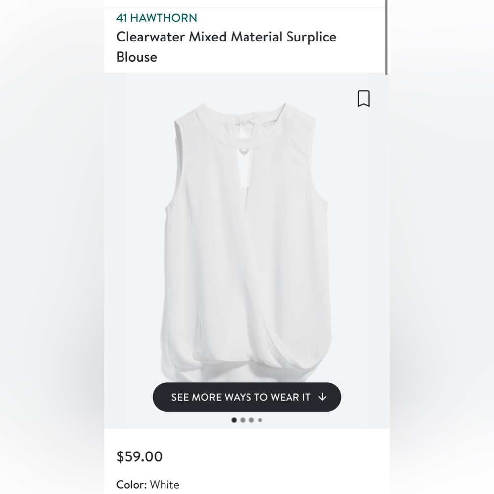 Sleeveless white blouse with folded front detail